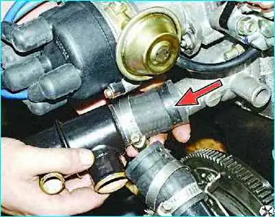 Снятие и установка термостата Снятие и установка термостата