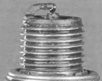 Мостик между электродами свечи