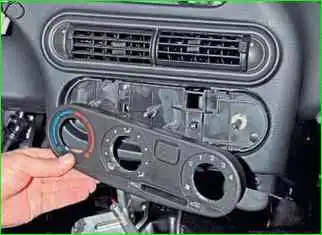 Removing the air conditioner control unit