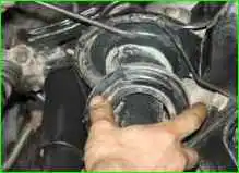 How to replace the front suspension spring VAZ-2123