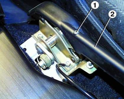 Removing and installing the GAZ-3110 parking brake lever