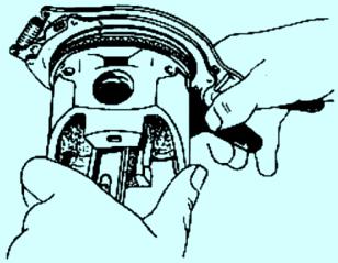 Removing piston rings from piston