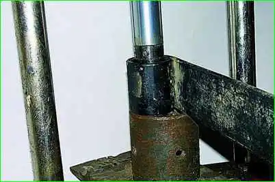 Removal and repair of the front spring GAZ-2705