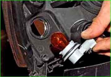 Replacing high and low beam lamps