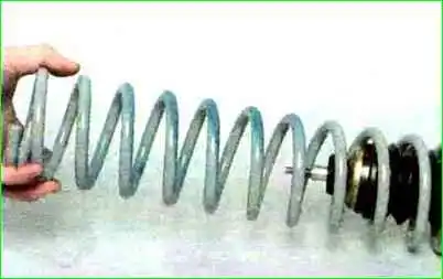 Ауыстыру артқы амортизатор Артқы амортизаторды ауыстыру