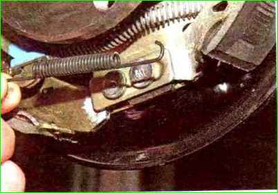 Replacing rear brake pads