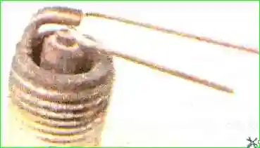 Checking and replacing spark plugs