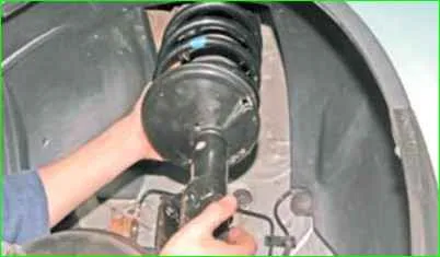 How to replace the front shock strut Lada Largus