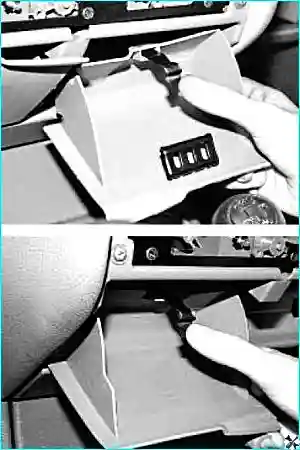 Извлечение пепельницы и бокса для мелких вещей из панели приборов