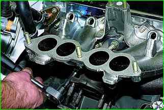 How to replace intake pipe gaskets VAZ-21214