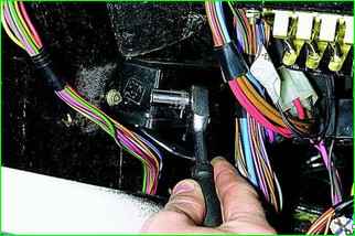 Removing the windshield wiper relay