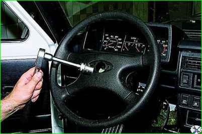 Removing the steering column three-lever switch