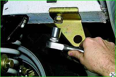 Removing the front bumper of a car