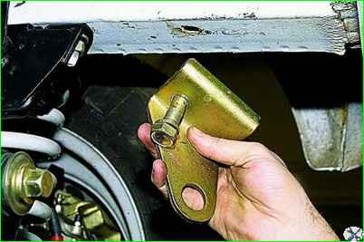 Removing the front bumper of a car